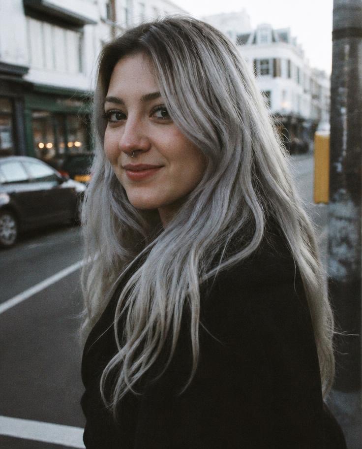 Model with long silver grey ombré hair