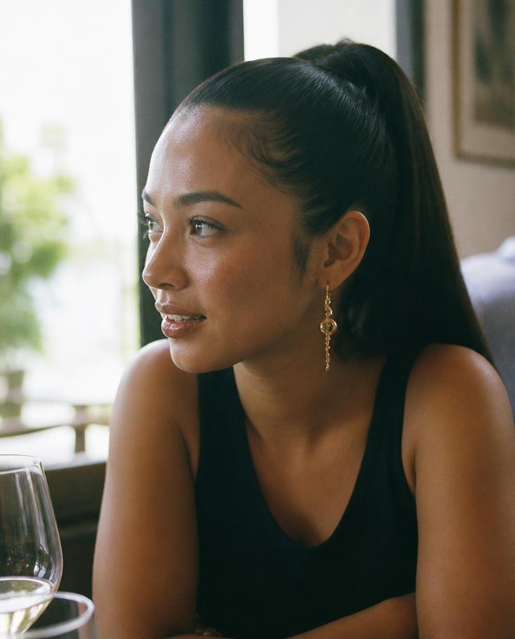 Model with a sleek high ponytail